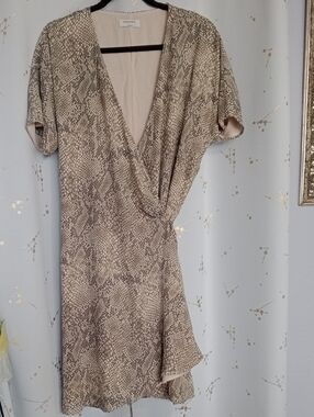 Babaton Blush Pink Top with Subtle Snake-Print Trim